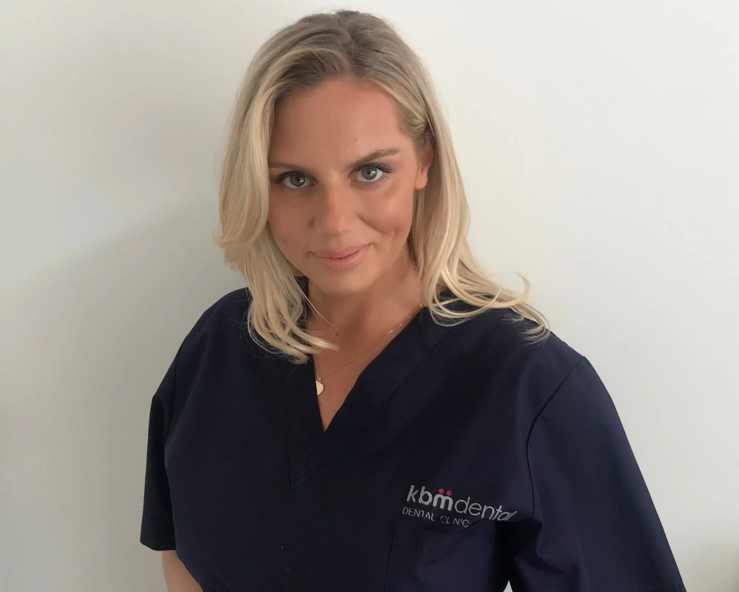 A KBM Dental dentist reviewing a treatment plan
